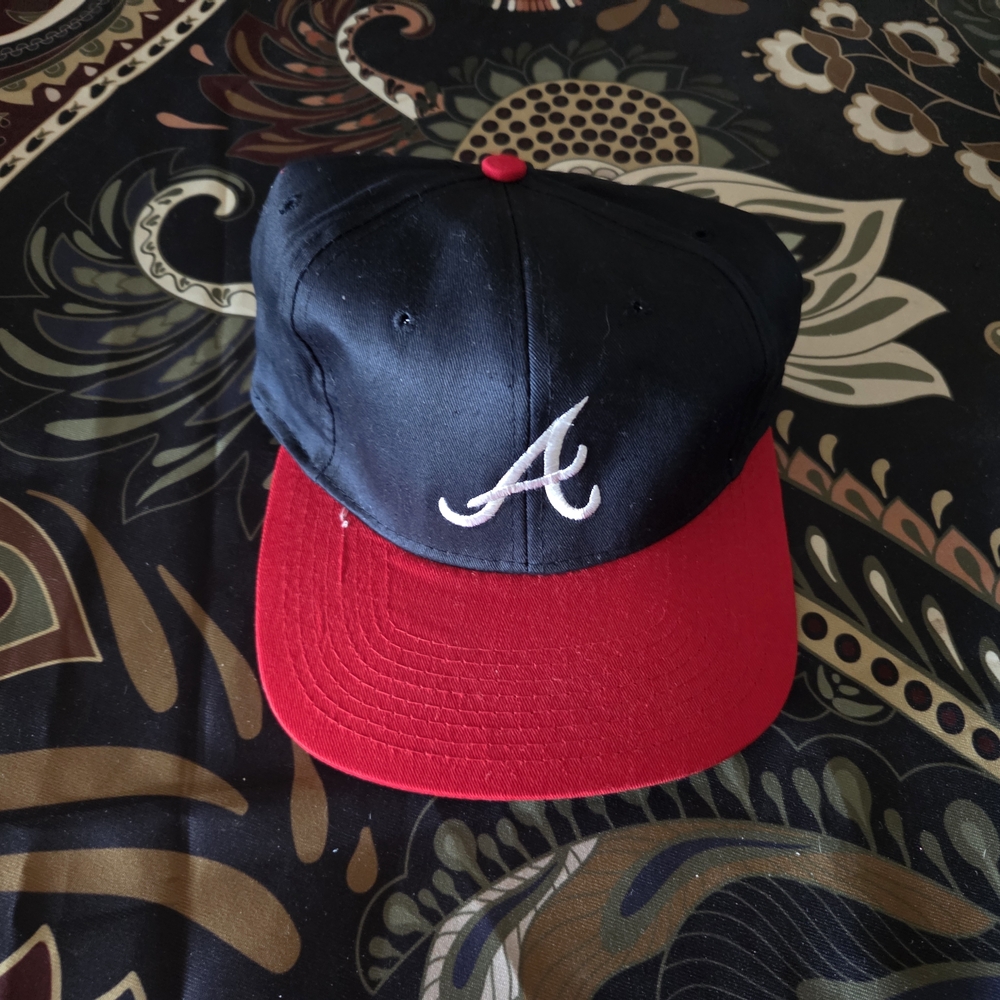 Genuine Merchandise Black and Red Hat